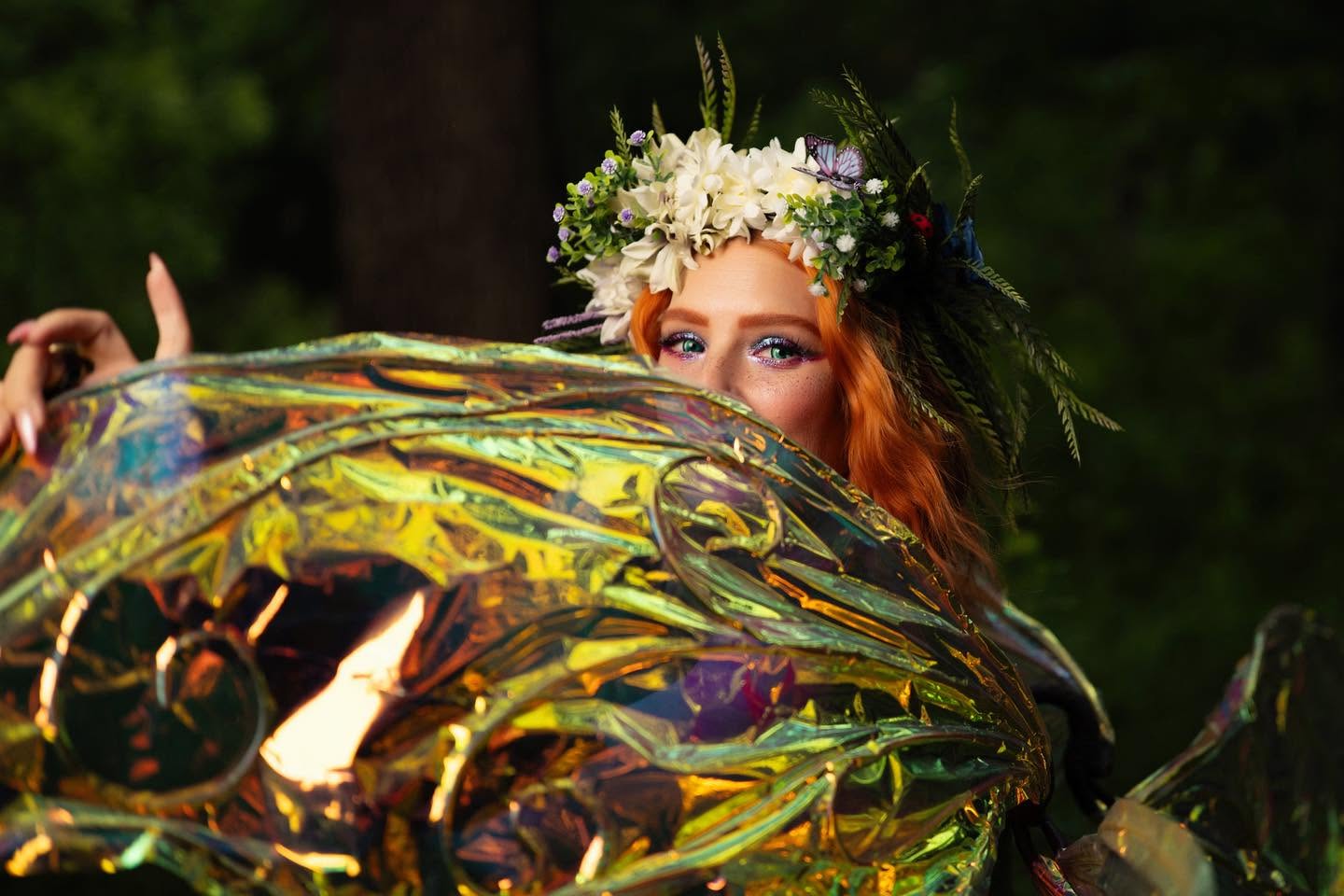 Beetle the Fairy in profile among the ferns
